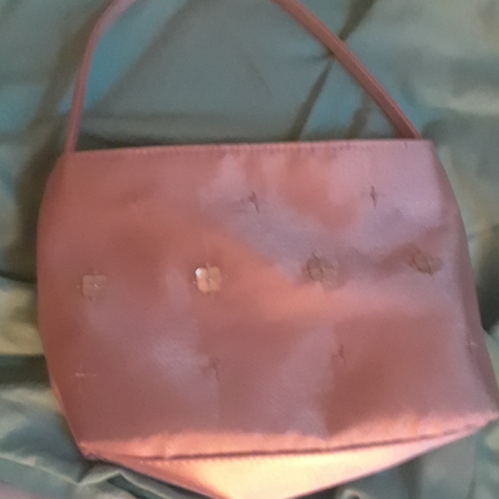 A blush pink small purse